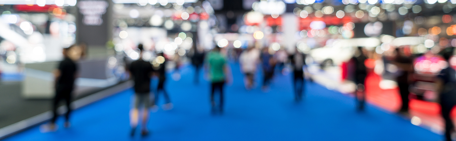 people walking at tradeshow